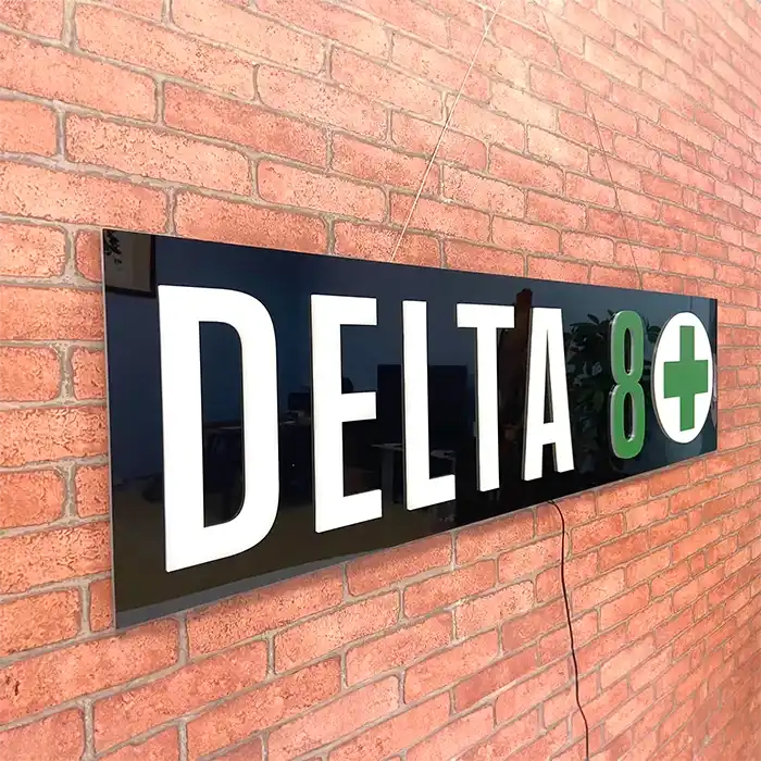 Smoke shop Delta 8 LED Retail ready sign against a red brick wall not lit