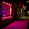 Front of Tattoo Shop sign LED displayed at night