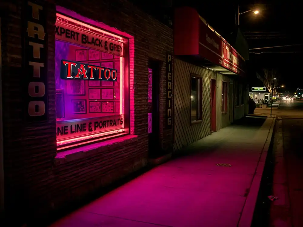 Front of Tattoo Shop sign LED displayed at night