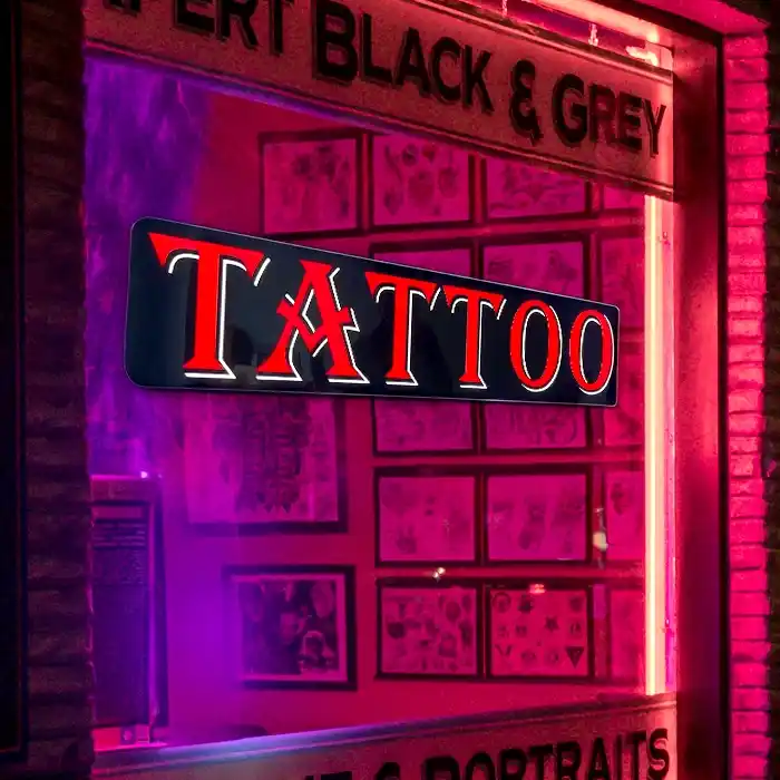 closeup Tattoo LED window sign brightly lit at night