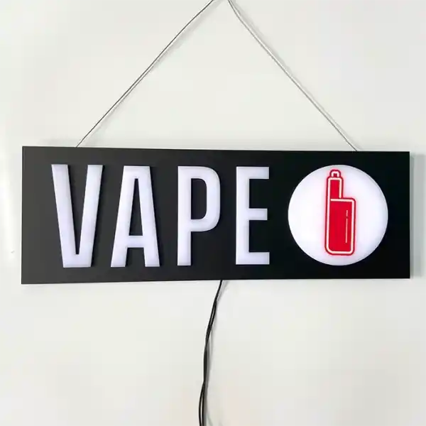 Vape LED Sign for vape stores and smoke shops, hanging on a white wall