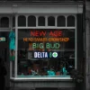 Delta 8 weed LED light sign advertised outside a Grow Shop sign LED
