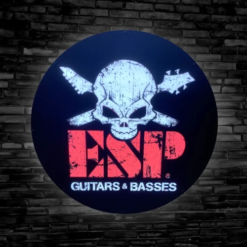 ESP Guitars & Basses with Skull and Guitar heads as cross bones LED bar sign against black brick wall